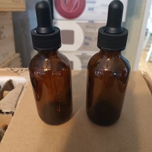 Bottle with drop lid